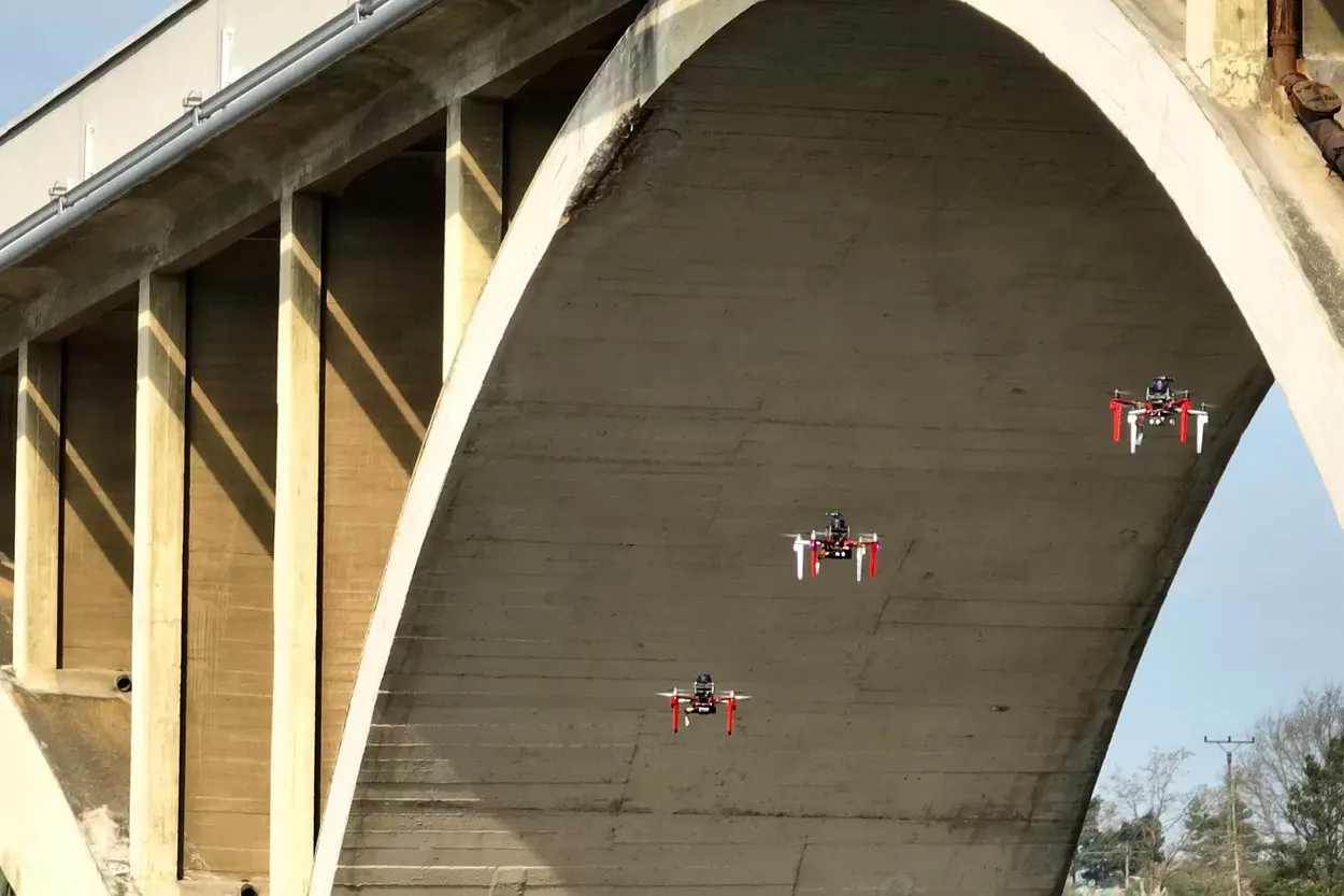 The Fly4Future UAV Swarm inspecting a bridge