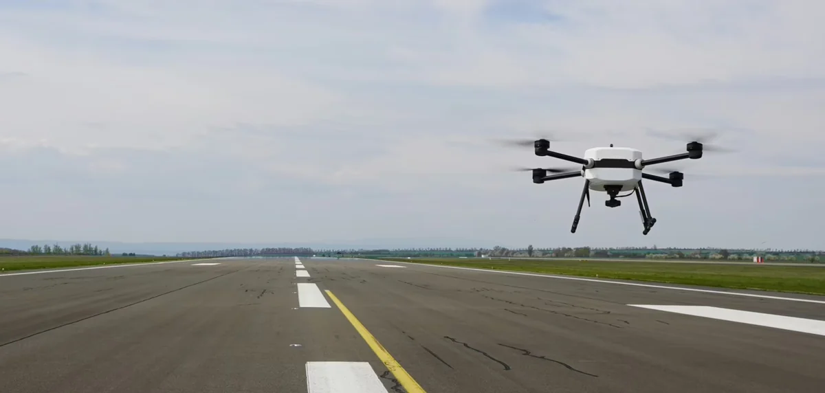 RoboCore lifting off from a runway